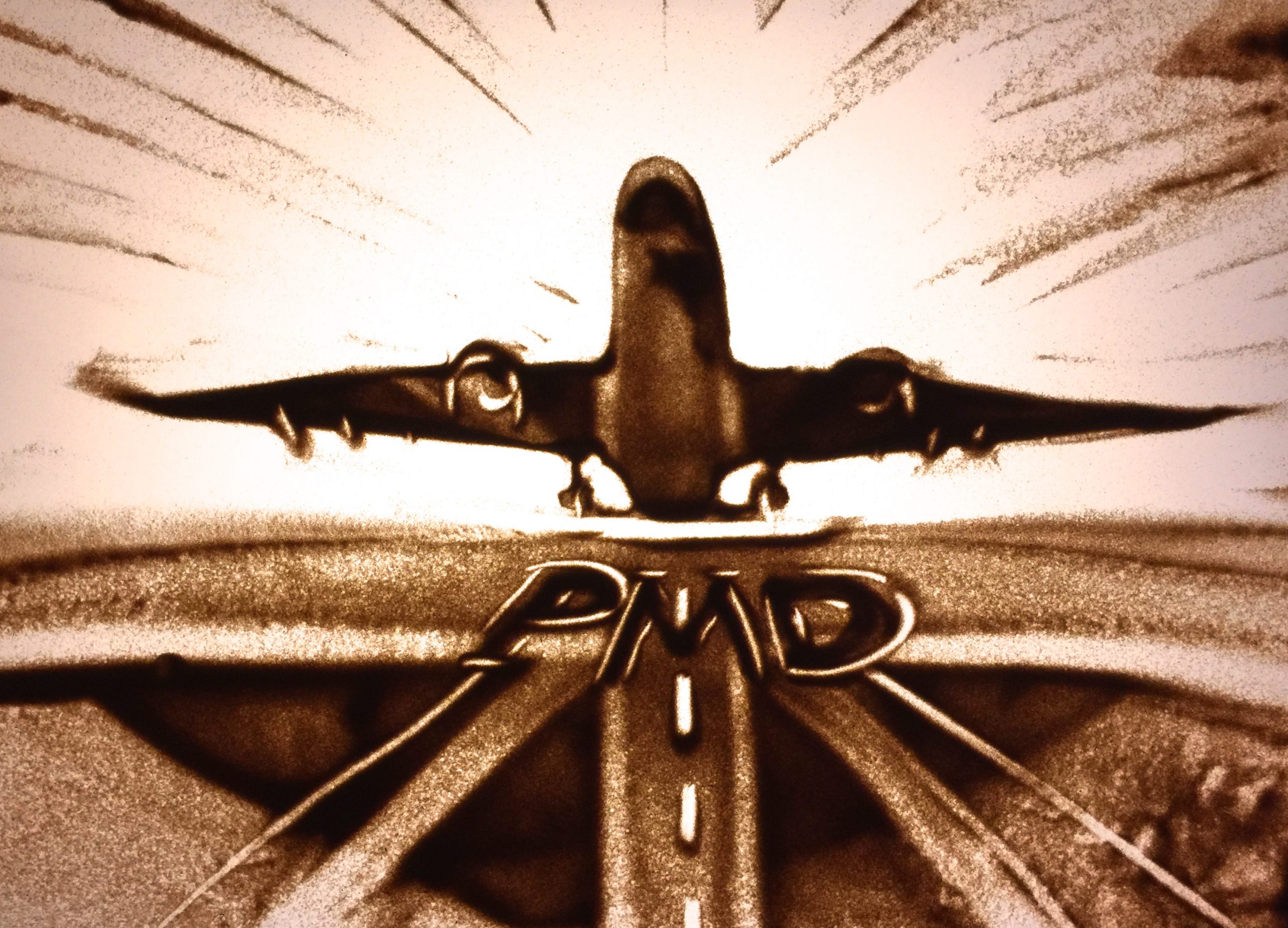 Sandbild eines Passagierflugzeugs
